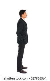 Indian Business Man With Coat Standing, Side View