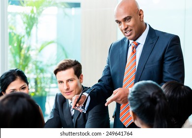 Indian Business Man Leading Team Meeting Of Diversity People In Office