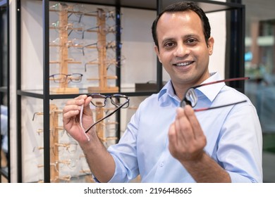 Indian Businessman Tries On And Chooses Glasses In Optical Store, Choose Which One You Like, Both Of Them