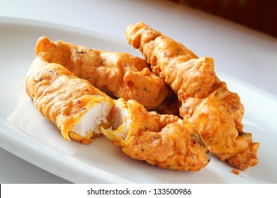 indian chicken pakora on white plate