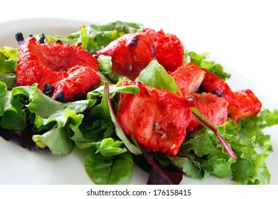 Indian chicken tikka salad isolated on white background
