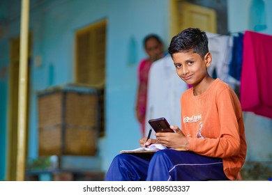 indian child attending online lecture