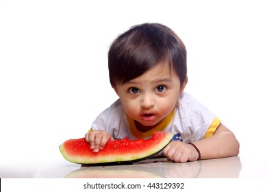 Indian Child Eating Watermelon