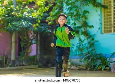 Indian Child Running At Playground