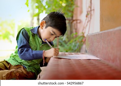 Indian Child Studying 