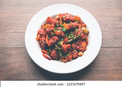 chicken 65 images stock photos vectors shutterstock https www shutterstock com image photo indian chilli chicken dry served plate 1237679497