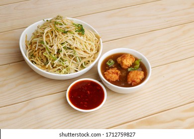 Indian Chinese Dish Combo Of Veg Noodles And Chili Chicken Or Manchurian, Veg Manchurian Or Chili Paneer