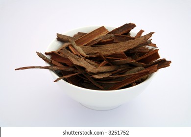 Indian Cinnamon Sticks (cassia Bark) In A White Bowl.