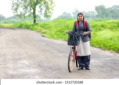 Indian College Girl With Bicycle 