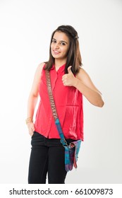 Indian College Girl, Portrait Of Pretty College Girl Student With Books And College Bag Smiling On 1st Day Of Session, Isolated Over White Background