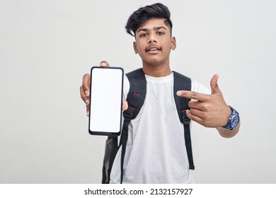 Indian College Student Showing Mobile Screen On White Background.