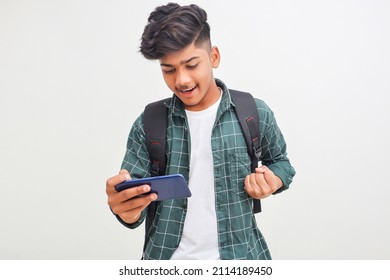 Indian College Student Using Smartphone On White Background.