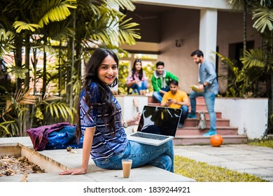 Indian College Students - Girl Student Studying On Laptop With Other Friends In The Backdrop