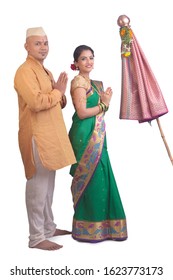 Indian Couple Performing Or Celebrating Gudi Padwa Puja. Holy, Maharashtrian. Indian Couple Praying In Traditional Wear