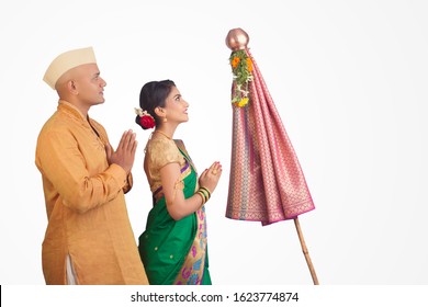 Indian Couple Performing Or Celebrating Gudi Padwa Puja. Holy, Maharashtrian. Indian Couple Praying In Traditional Wear