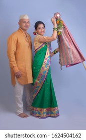 Indian Couple Performing Or Celebrating Gudi Padwa Puja. Holy, Maharashtrian. Indian Couple Praying In Traditional Wear