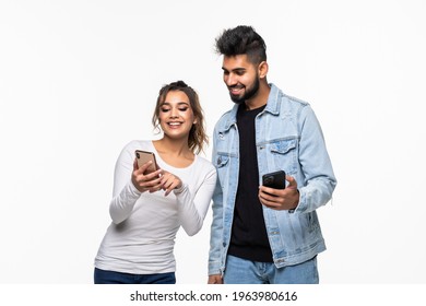 Indian Couple, Woman Spying Looking At Her Boyfriend Phone On White Background