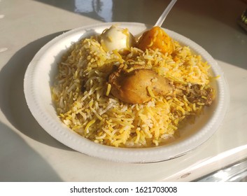 Indian Cuisine - Kolkata Biryani Made With Basmati Rice, Chicken, Boiled Egg And Potato.