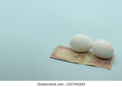 The Indian currency -  20 rupee note with eggs on the blue background
