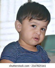 Indian Cute Baby Boy Image. Baby Look At The Camera. 