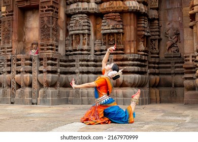 Indian Dancer posing at temple. Odissi dance form. Dance of India