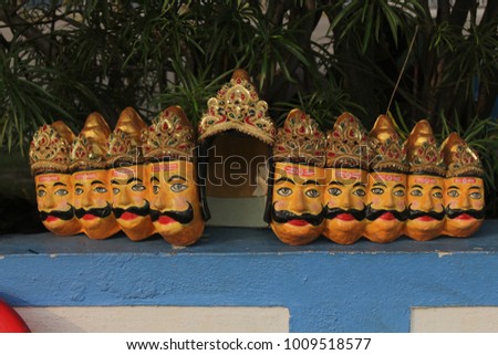 indian devil Ravan with 9 face mask on wall