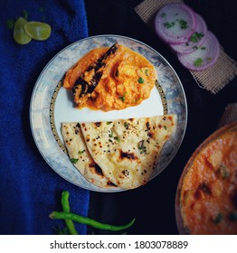 Indian Dish Kadhai Paneer With Garlic Naan