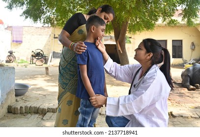 Indian doctors doing social service at village - Shutterstock ID 2137718941