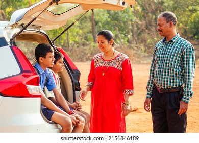 Indian Family Buying A New Car And Ready To Go On Beach Vacation