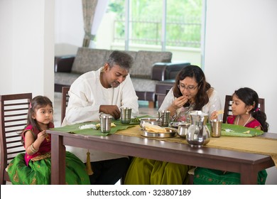 Indian Family Having A Meal