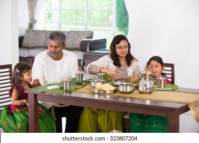 Indian Family Having A Meal