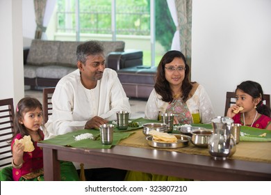 Indian Family Having A Meal