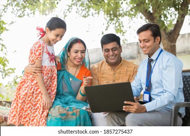 Indian Family Meeting Financial Advisor At Village