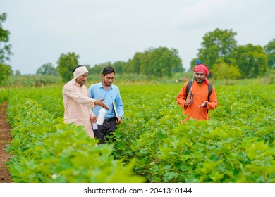 Indian farmer Discussing with agronomist at Farm and collecting some information