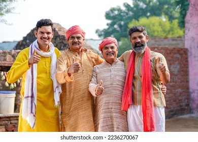 Indian farmers or villagers group showing thumps up - Shutterstock ID 2236270067