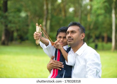 Indian Father And Son Fatherhood Session With A Sling Shot