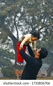 An Indian Father And Son Spending Happy Moments.