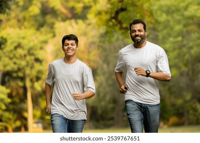 Indian Father-Son Bonding Through a Joyful Morning Run in Nature - Powered by Shutterstock