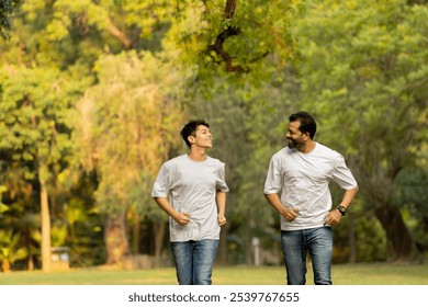 Indian Father-Son Bonding Through a Joyful Morning Run in Nature - Powered by Shutterstock