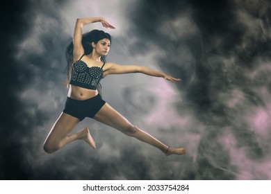Indian Female Model Performing Acrobatic Dance Poses