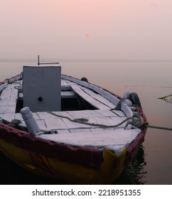 Indian Fishing Boat In Ganges River In Varanasi Gaht In India