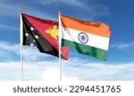 Indian flag and Papua New Guinea flag on cloudy sky. waving in the sky