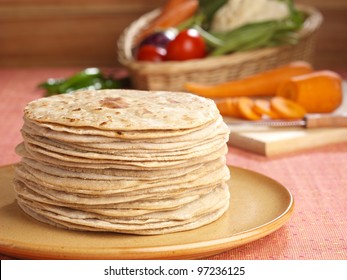 Indian flatbread called chapati  (Selective Focus, Focus on the front chapatis)