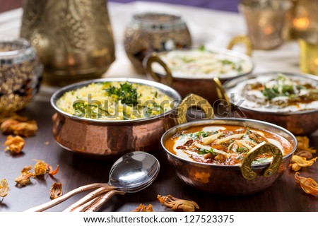 indian food in brass bowl