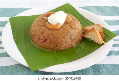 Indian Food, Bread Halwa, A Delicious Sweet Dish, With Ice Cream Topping.