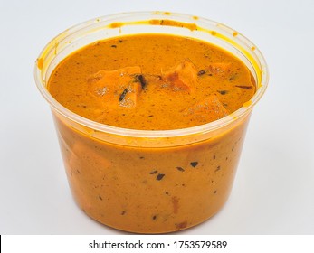 Indian Food In Takeout Container, Butter Paneer In Takeaway Plastic Bowl On White Background For Eat At Home, Delivery Food.