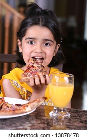 Indian Girl Eating Pizza Slice