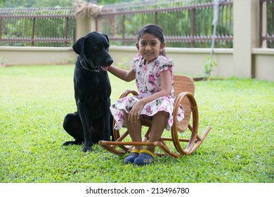 Indian Girl With Family Dog Outdoor