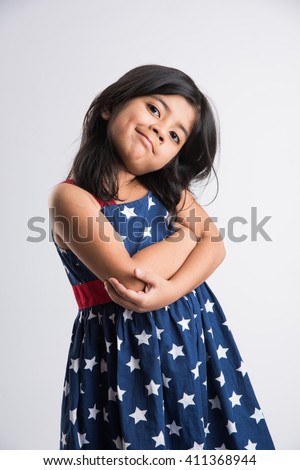 Indian girl posing for photo shoot with joyful and different expressions, isolated over white background