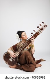 Indian Girl With Sitar